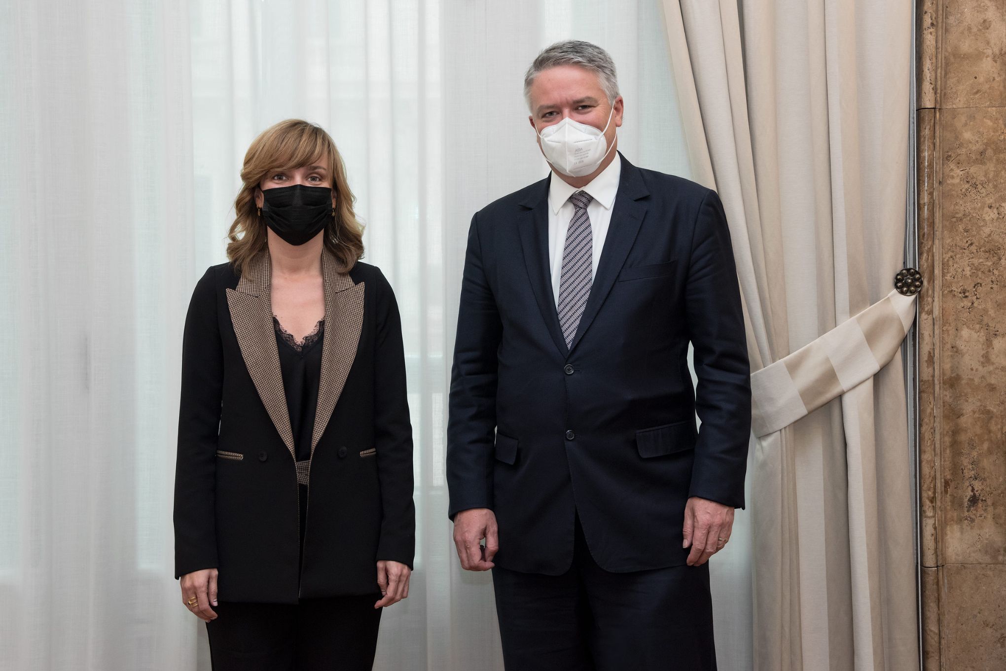 La ministra de Educación y Formación Profesional, Pilar Alegría, y el secretario general de la OCDE, Mathias Cormann