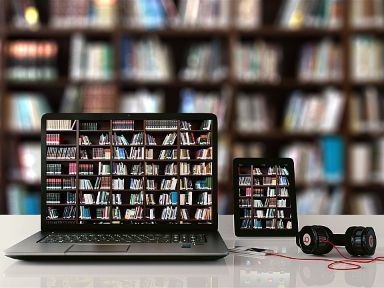 Portátil, tablet y libros