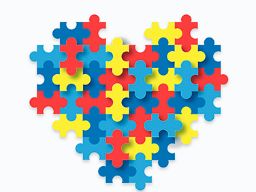 Ilustración de un corazón hecho de piezas de puzzle.